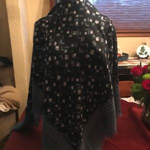 Blanket scarf light blue, black and dark green.